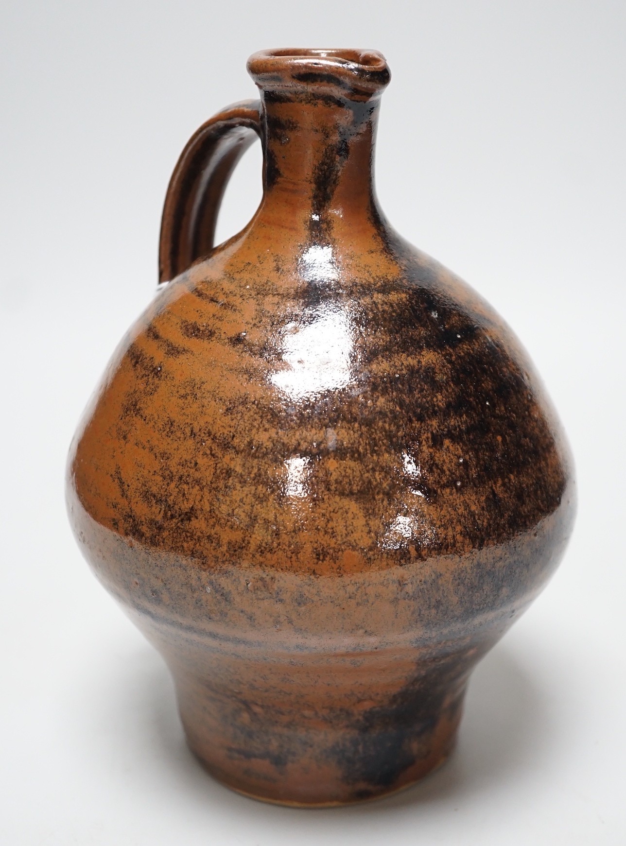 A studio Tenmoku glazed jug, 21.5cm